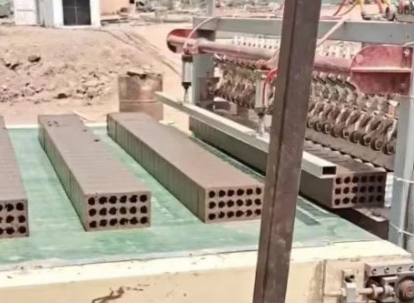 Brick Making Machine South Africa: Your Complete Investment Guide for 2026 13 Manual brick making machine operated by worker in South African workshop