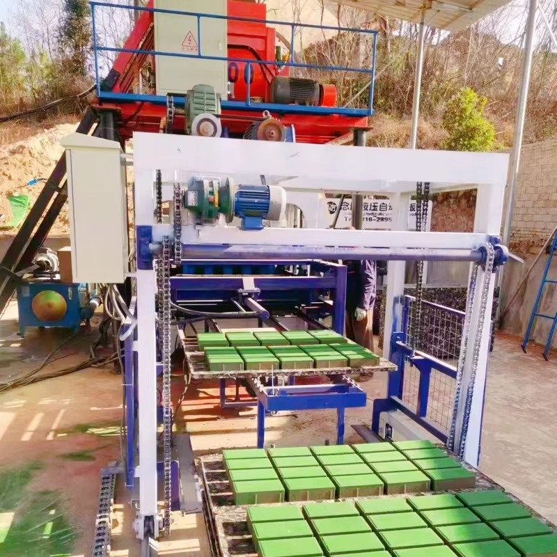 Modern paving brick making machine producing interlocking pavers in industrial facility
